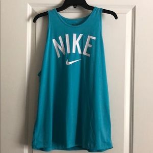 Nike women’s turquoise rackerback tank large